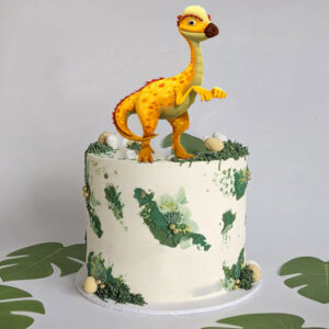 Roar into Your Child's Birthday with a Dinosaur Printed Topper Cake!