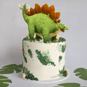 Roar into Your Child's Birthday with a Dinosaur Printed Topper Cake!
