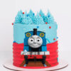 Add some fun and excitement to your little one's birthday party with this Thomas the Tank Engine Printed Topper Cake!