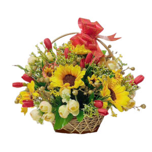 artificial flower basket with sun flowers , roses and greens