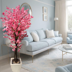 This exquisite faux tree captures the iconic charm of cherry blossoms, offering a stunning visual centerpiece that requires absolutely no maintenance.