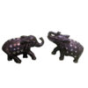 This black polymer elephant evokes a sense of mystery and power.