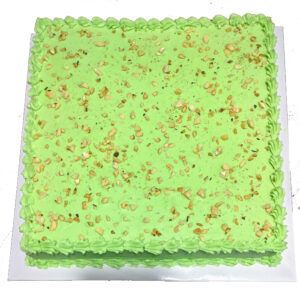 buttercream ribbon sheet cake with cashew topping