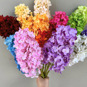 meticulously designed to replicate the vibrant colors and nuanced textures of real hydrangeas.