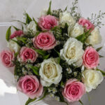 Elegant Charm: 12 Pink & White Roses with Green Fillers Bouquet