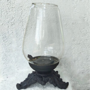 Includes a clear glass chimney and a matching candle holder base for a complete and cohesive look.