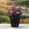 lifelike pink and white roses in a wooden vase