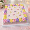 Vibrant Pastel Buttercream Floral Garden Ribbon Cake