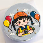 Cheerful Girl Themed Birthday Cake