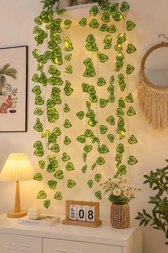 Bring vibrant energy and timeless elegance to your spaces with our Deluxe Artificial Money Plant Green Vine Garland
